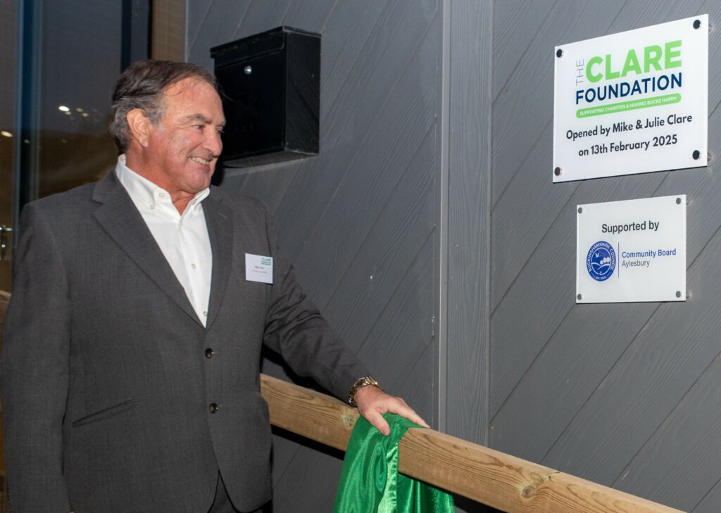 Mike Clare, TCF Founder & President unveiling a plaque at The Clare Community Shed