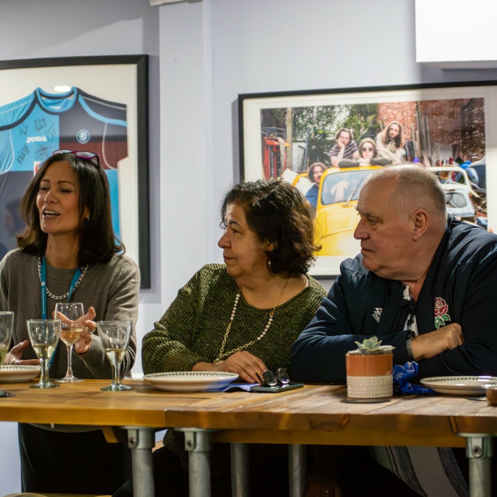 Staff & volunteers from The Oasis Partnership chatting