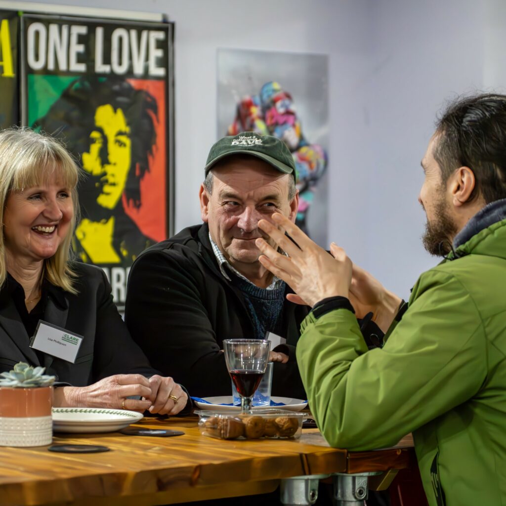 Staff & volunteers from The Oasis Partnership having a chat